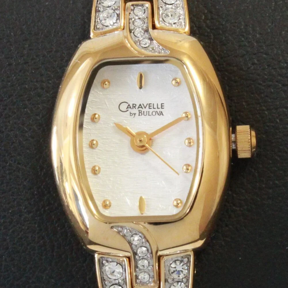 Caravelle Ladies Gold Tone Quartz Watch, MOP Dial, ½ Bangle Bracelet 16mm